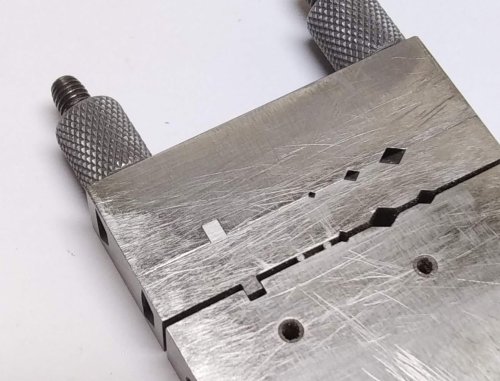 Judy Larson's Ripple Bracelet  - , Metalwork, Cutting, Cutting Tool, Cutters, Dapping, Dapping Jewelry, Filing, Finishing, Findings, Clasps, Components, Tumbling, Tumble, Tumbling Jewelry, Butane Torch, Soldering, Solder, Tools, Cut the excess jump ring away with flush cutters.